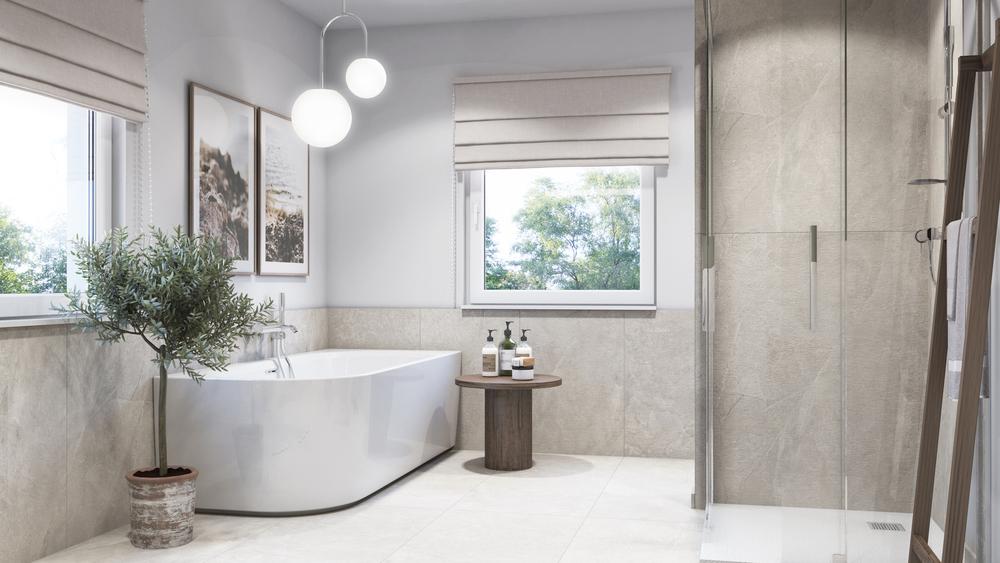 Minimalistyczna łazienka z płytkami w kolorze jasnego betonu i drewnianymi dodatkami