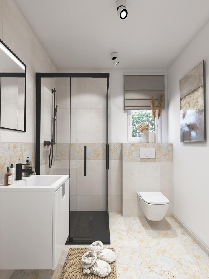 Jasna łazienka z szarymi płytkami i pastelowymi akcentami