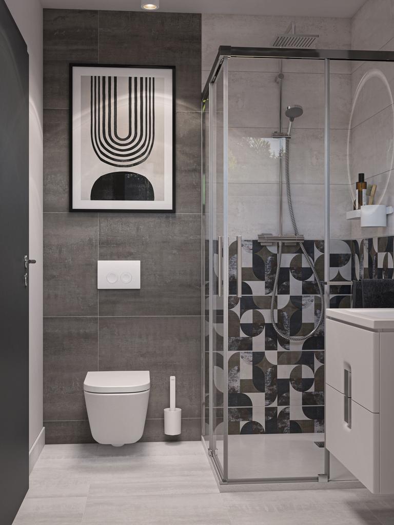 Nowoczesna łazienka w kolorze białym i szarym z geometrycznym wzorem w kabinie prysznicowej