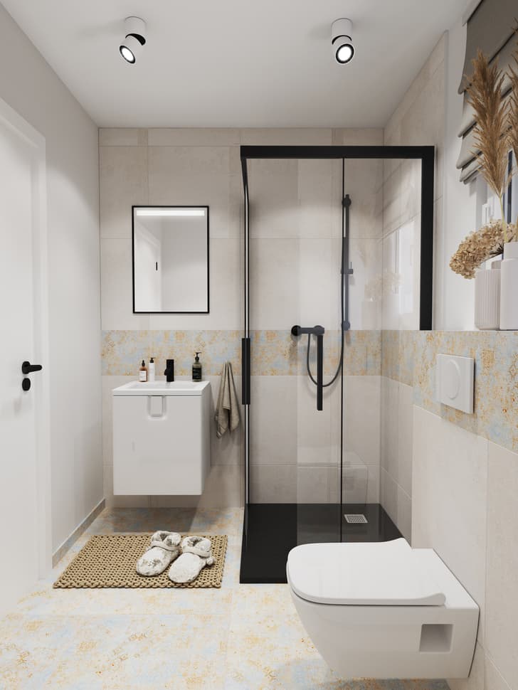 Jasna łazienka z szarymi płytkami i pastelowymi akcentami