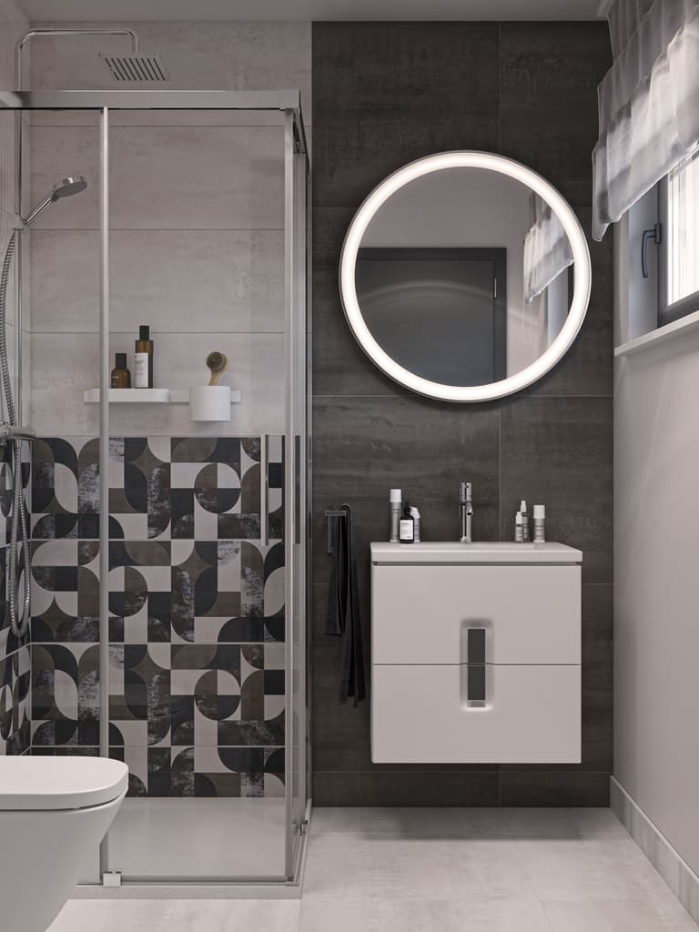 Nowoczesna łazienka w kolorze białym i szarym z geometrycznym wzorem w kabinie prysznicowej